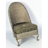 A vintage Lloyd Loom style chair with upholstered seat,