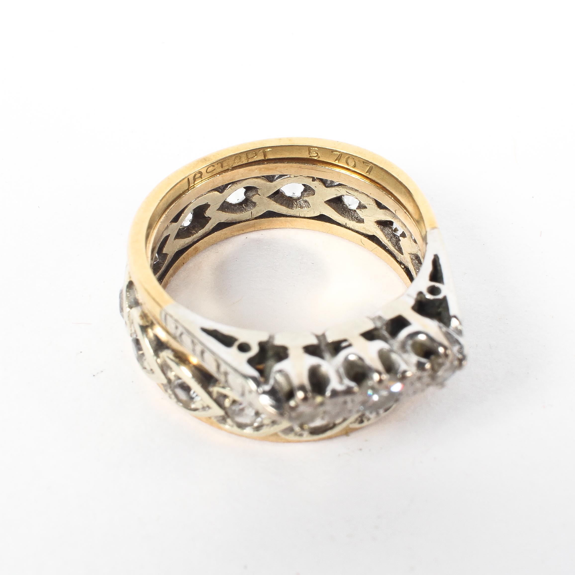 A 9ct gold three stone diamond ring together with a 9ct full eternity ring. 5.6g. - Image 3 of 3