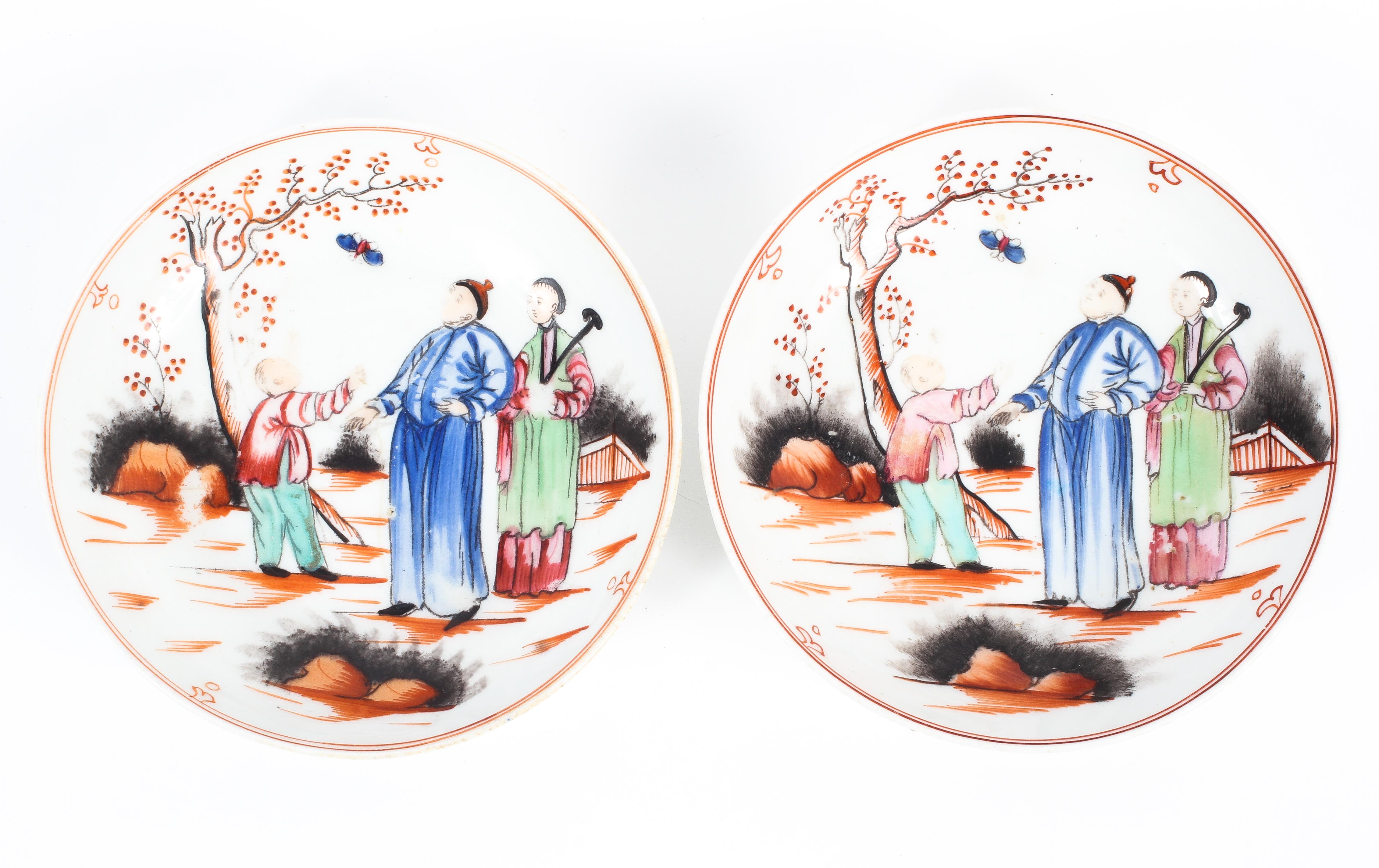 Two English porcelain saucers decorated with the 'Boy and Butterfly' pattern, circa 1800,