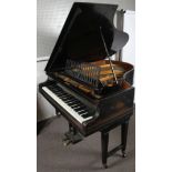 A vintage C. Bechstein baby grand piano, on wheels, in ebonised case, approximately 162cm long.