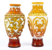 Two 20th century Chinese Peking glass vases in graduated yellow-orange glass over white,