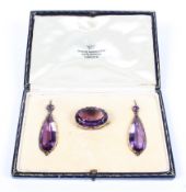A suite of Victorian amethyst jewellery to include a pin brooch and chandelier drop earrings,