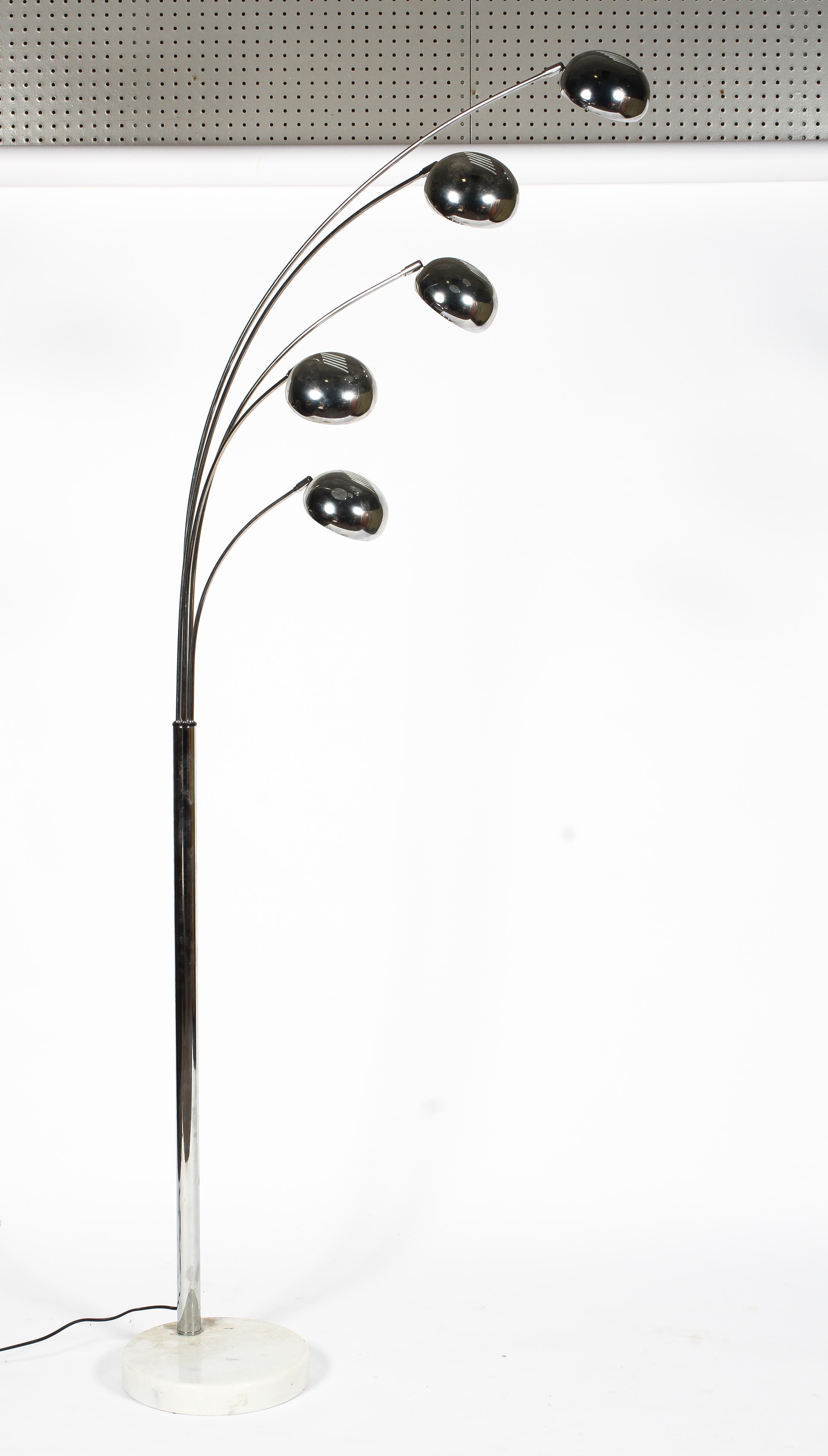 Manner of Goffredo Reggiana, a chrome five arm arc style floor lamp on circular marble base,