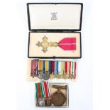 A Boxed OBE medal together with corresponding collection of seven dress medals