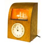 A Metamec mid-century mantle clock, inset with a galleon, with silver and cream dial,