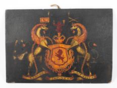 An enamelled and gilt armorial wooden rectangular panel, late 18th/early 19th century,