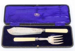 A George V cased set of silver serving utensils