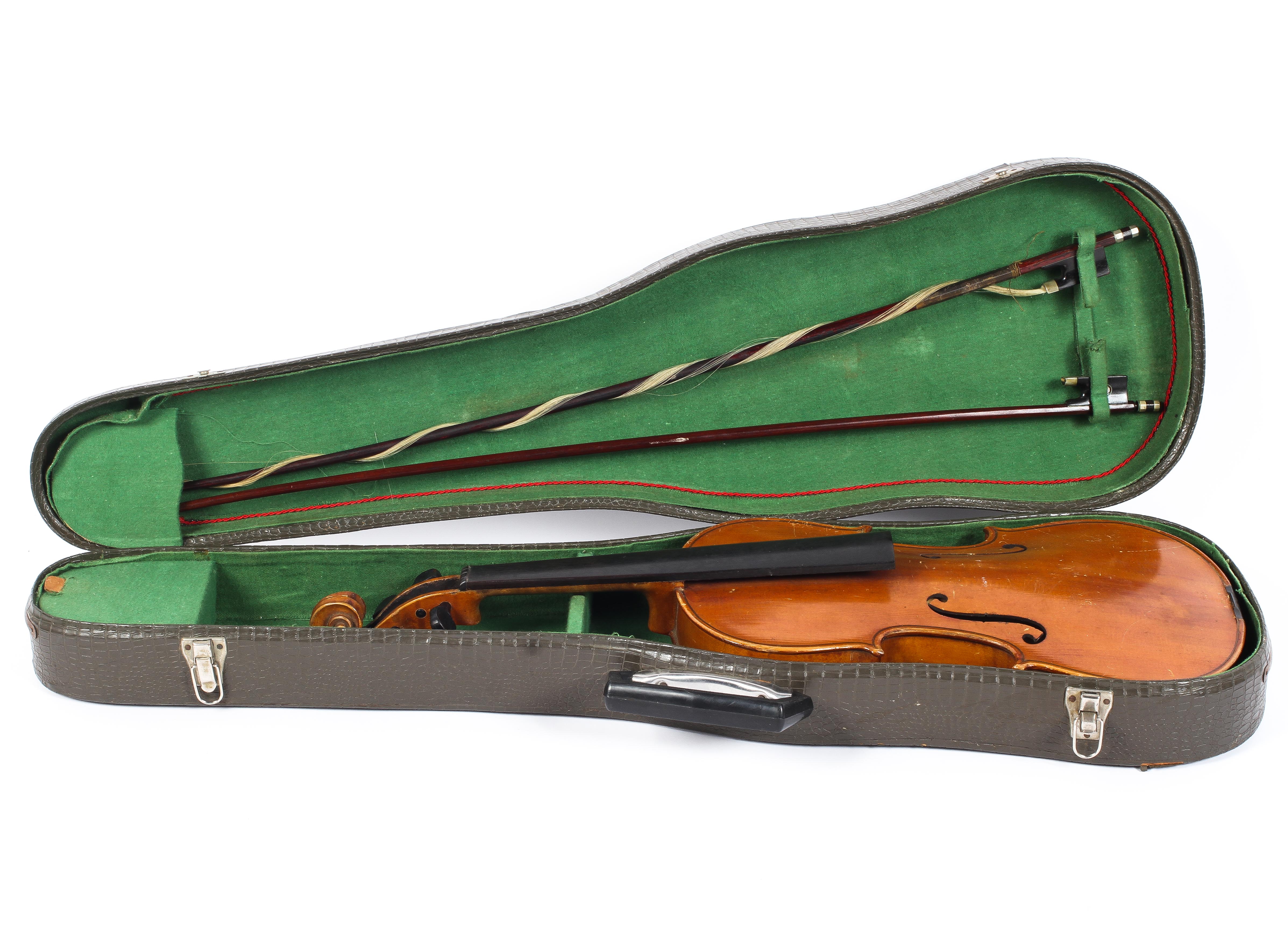 A Thomas Craig violin, circa 1900, applied with label to interior, with two bows and later case,