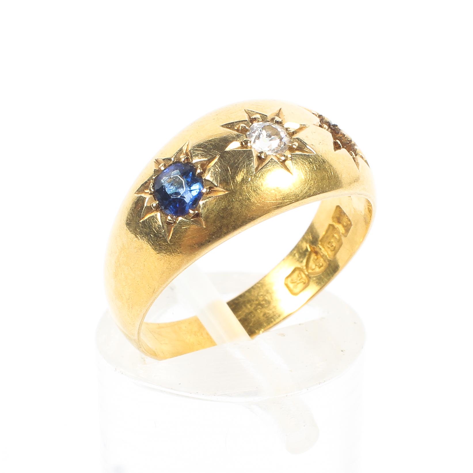 An 18ct gold sapphire and diamond ring,