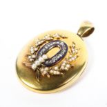A Victorian yellow metal oval picture locket with seed pearl rose cut diamond and enamel decoration.