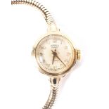 A lady's 9ct gold wristwatch by Roamer, the dial with Arabic numerals denoting hours,