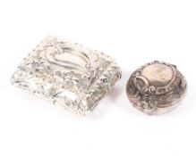 Two silver patch/snuff boxes, one of rectangular form with gilt interior, the other circular,