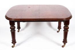 A Victorian mahogany dining table, with moulded rectangular top,