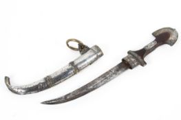 A Middle Eastern dagger, with sabre shaped blade and turned wooden handle,