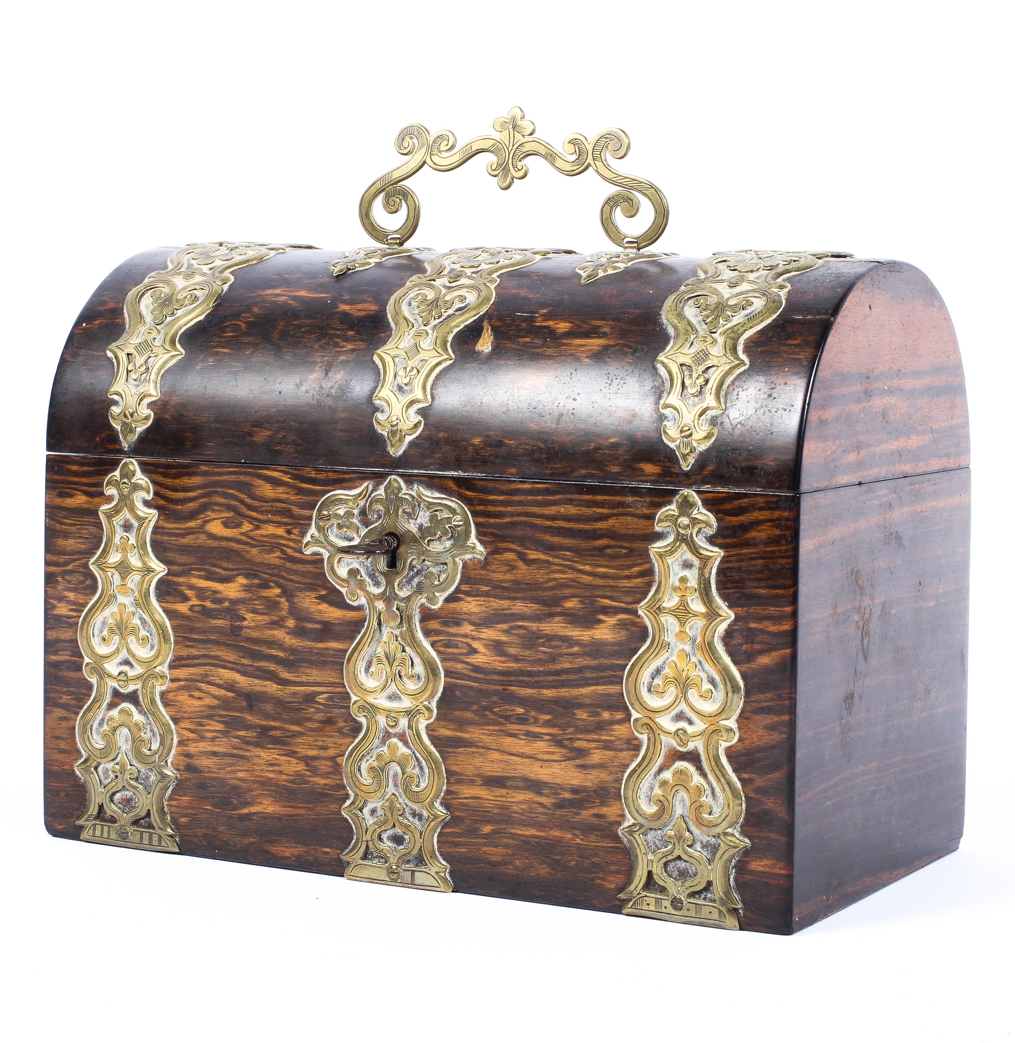 A Victorian brass bound coromandel domed stationary box, with pierced brass handle,