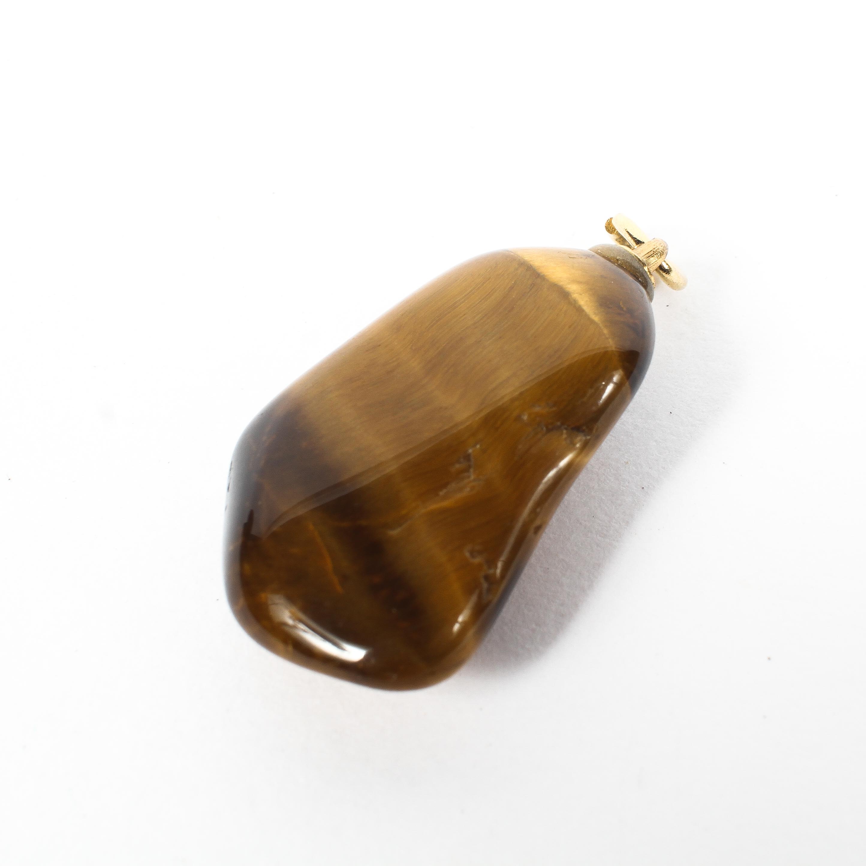 A tigers eye pendant on unmarked yellow metal bale. - Image 2 of 2