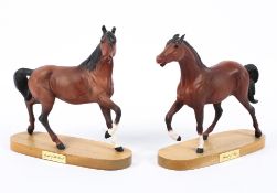 Two Beswick horses 'Spirit of the Wind ' and one other on oval wooden stands,