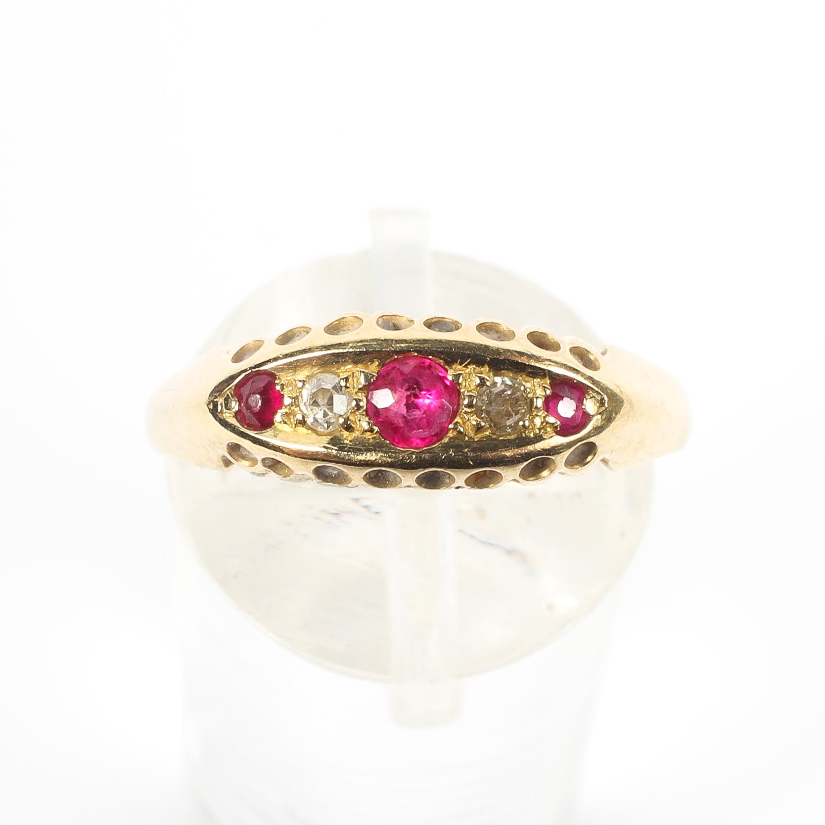 An 18ct gold ruby and diamond ring. Three round cut rubies with single cut diamond accents. 2.0g. - Image 2 of 4