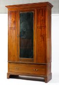 A late Victorian/Edwardian mahogany marquetry wardrobe,