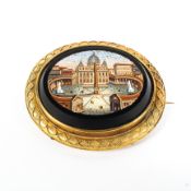 A 19th century yellow metal grand tour micro mosaic brooch depicting the Vatican, Rome,