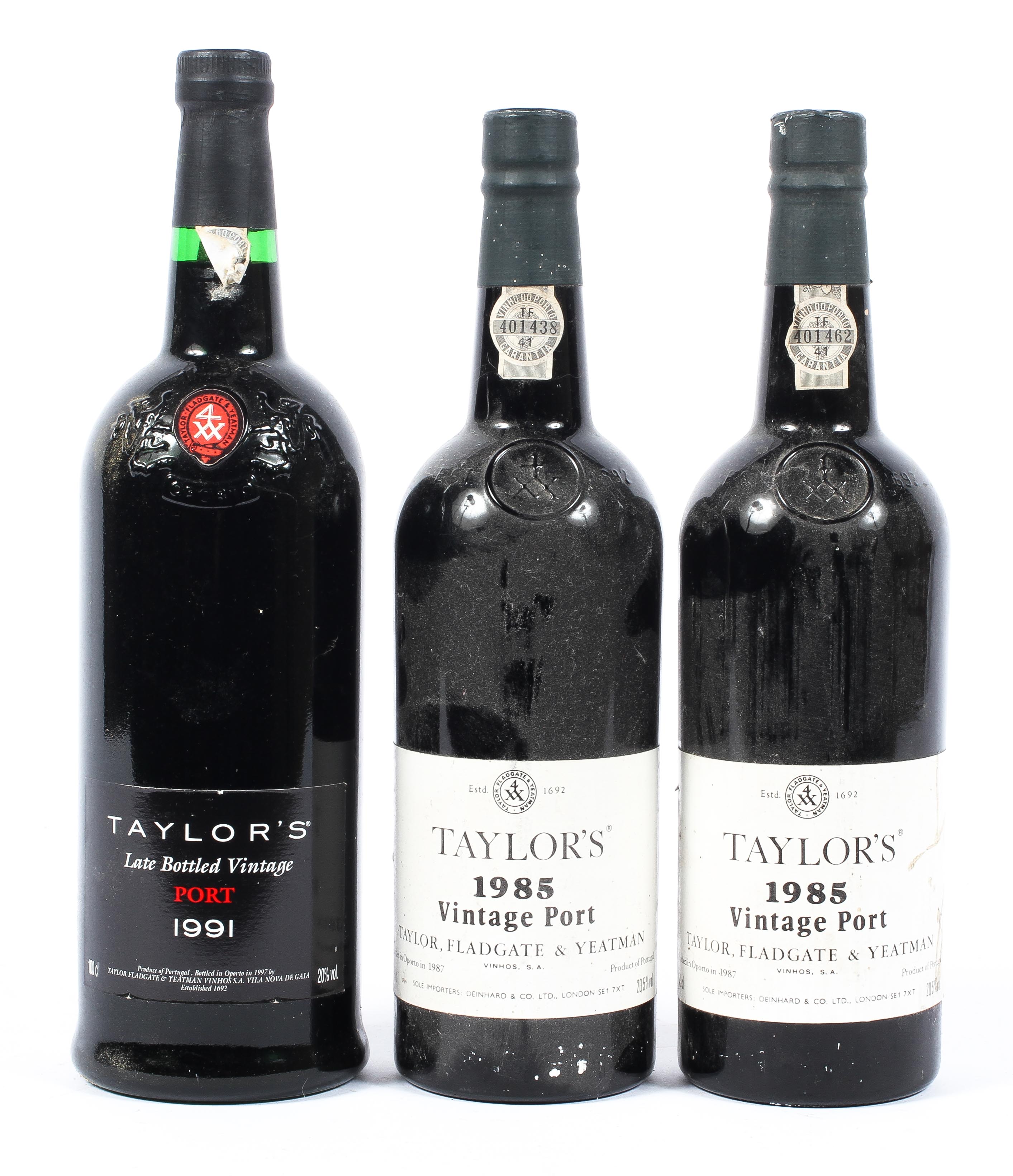 Three bottles of Taylors port, two 75cl bottle of 1985 Vintage port and one 100cl bottle 1991.