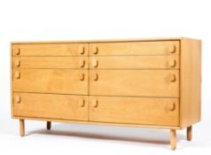 A Meredew retro pale oak chest of drawers, with two banks for four graduated drawers,