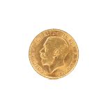 A George V gold sovereign 1911. 7.9g.