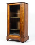 A Victorian walnut glazed music cabinet, of canted rectangular form,