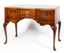 A 19th Century kneehole desk with walnut and mahogany veneer,