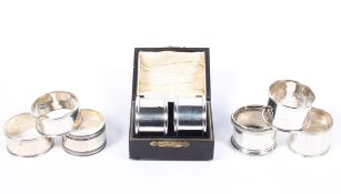 A collection of eight silver napkin rings, including two in a fitted box,hallmarked Birmingham 1926,