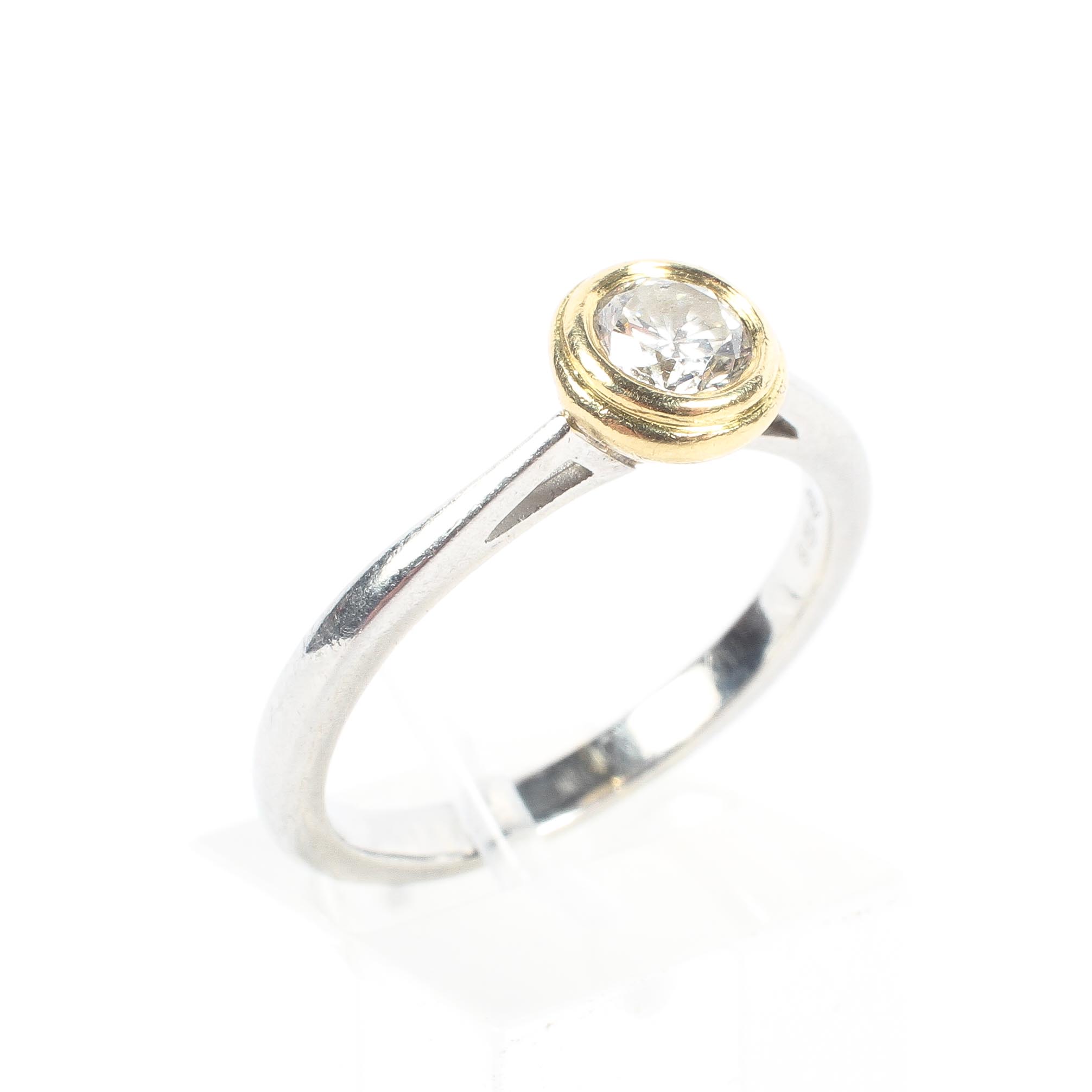 A 950 marked platinum and diamond single stone ring.