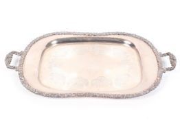 A large oval silver plated tray with loop handles and cast floral border. 63cm x 37cm.