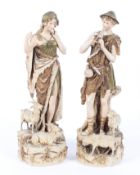 A pair of Royal Dux figures of a shepherd and companion, circa 1900,