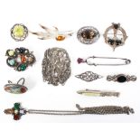 A collection of white metal hardstone Scottish jewellery items.