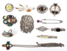 A collection of white metal hardstone Scottish jewellery items.