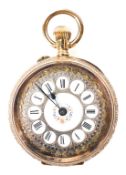 A Victorian ladies 14k gold fob watch, the ornate enamel dial with Roman numerals denoting hour,