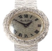 A Ladies Beuche Girod 18ct white gold manual wind wristwatch.