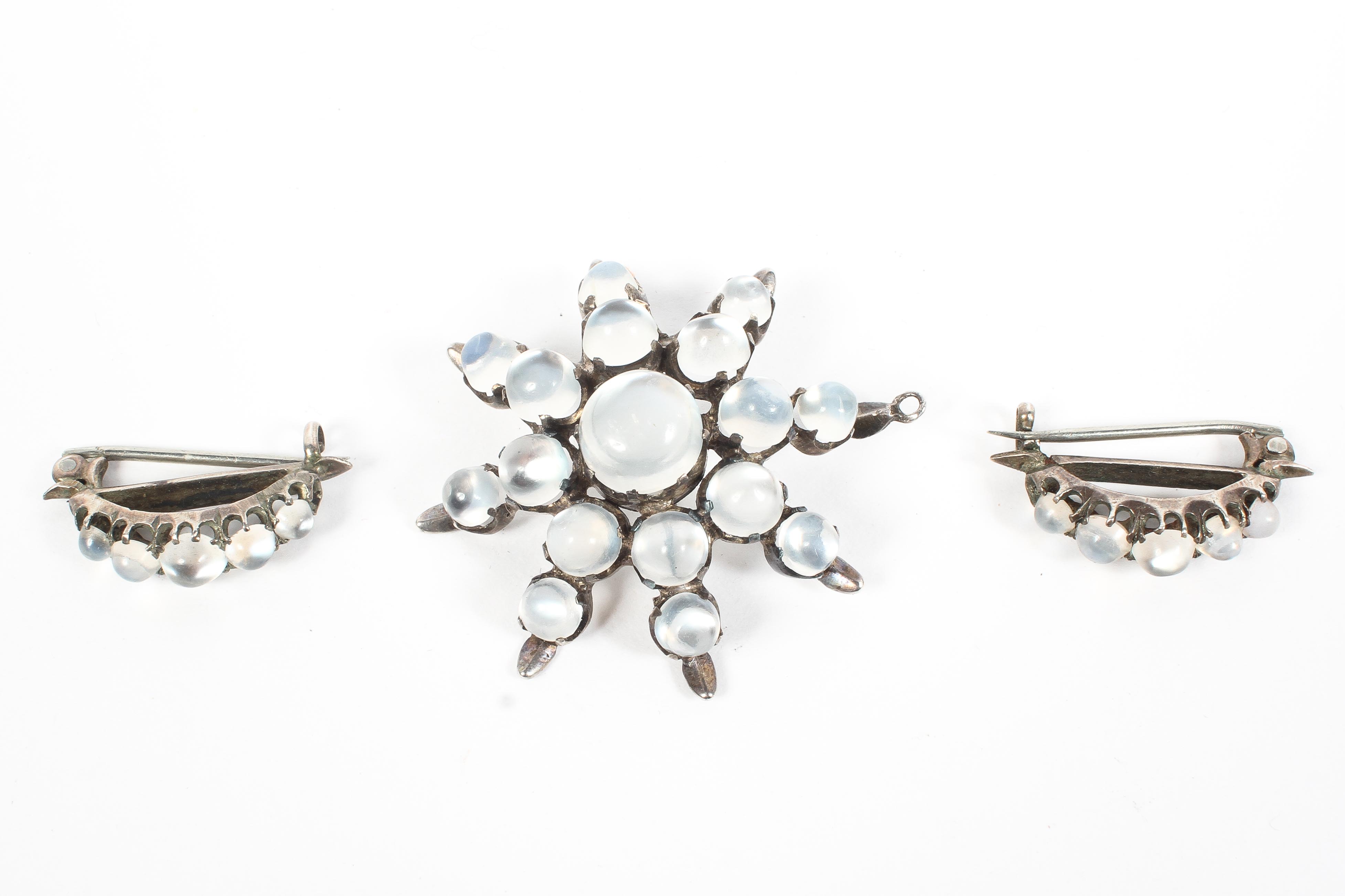 A Victorian moonstone set star brooch together with matching moonstone lapel clips. - Image 2 of 2