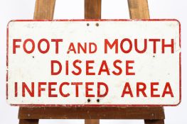 A rectangular enamel sign in red and white reading 'Foot and Mouth Disease Infected Area',