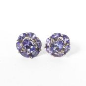 A pair of 14ct white gold tanzanite and diamond ear studs.