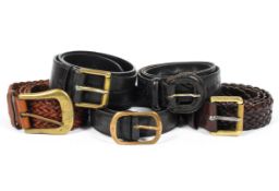 Five Mulberry belts, comprising three black leather examples and two of woven brown leather,