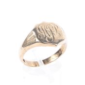 A Gentleman's 9ct gold signet ring. with shield cartouche. 6.4g. Size T.