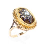 A Victorian 9ct gold ring, central pearl with a surround of rose cut diamonds and enamel detail.