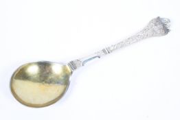 A 17th/18th century style white metal spoon with gilded bowl,