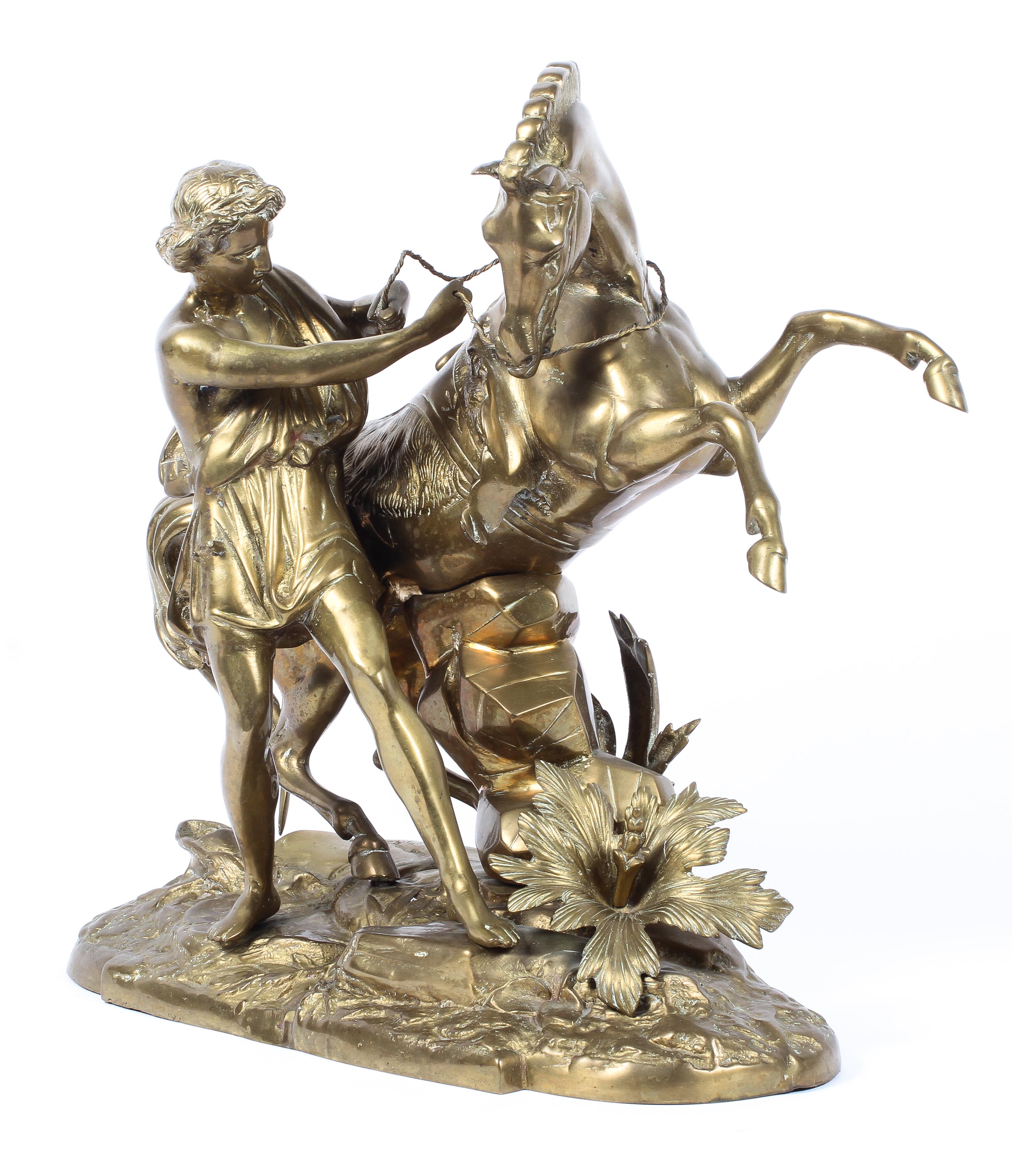 After Coustou, a large gilt metal model of a Marly horse on naturalistic oval base.