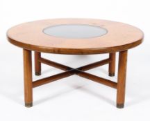 A mid-century G-plan teak 'Sunburst' coffee table, the top inset with smoked glass,