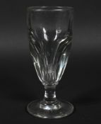 A Continental cut deceptive wine glass, circa 1800, the thick walled bowl cut with lenses,