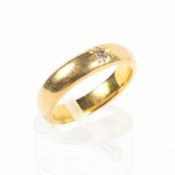 A 22ct gold diamond set wedding band. 5.8g. size K.