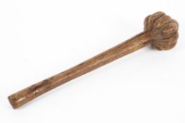 A 19th century Fijian Ula throwing club, carved with a lobed top and turned shaft,