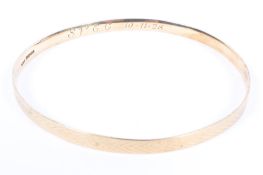 A 9ct gold bangle bracelet. 78mm(d) 15g.